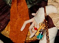 close up doll hand