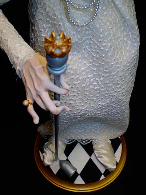 view of cane and goblet, character doll